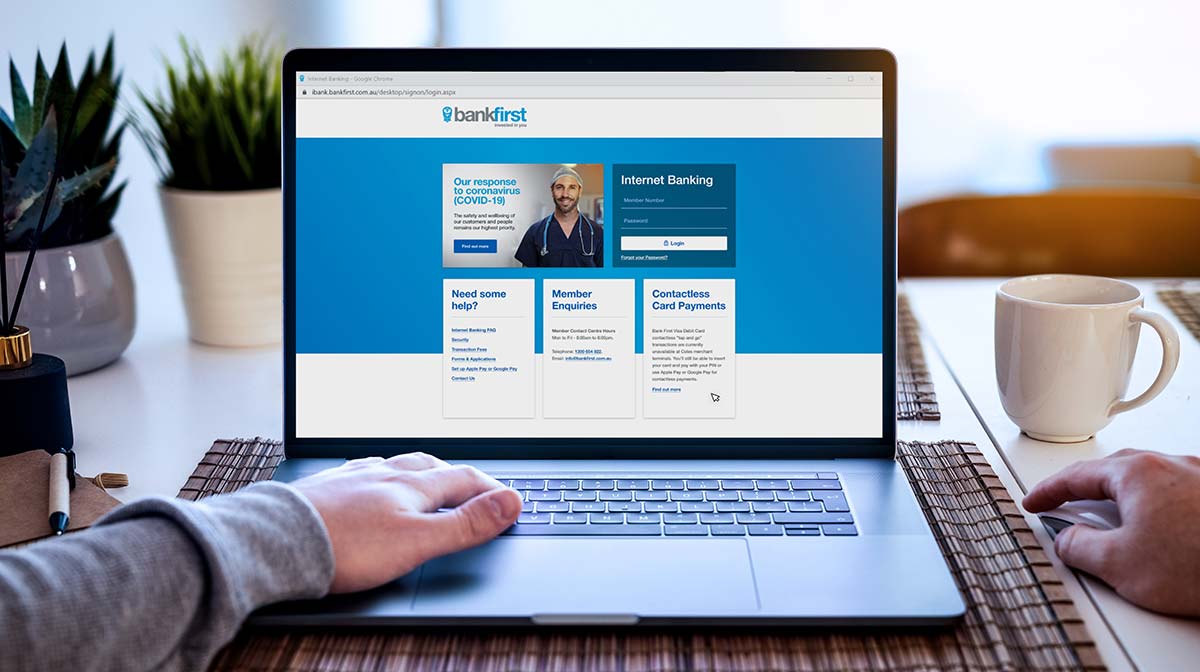 Man working on laptop in Haven Summit Credit Union internet banking