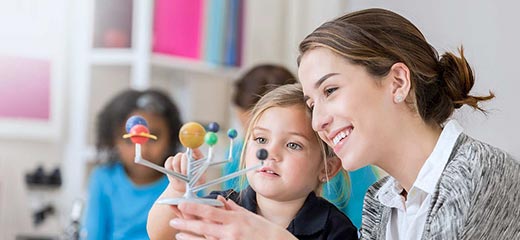 Student learning about solar system